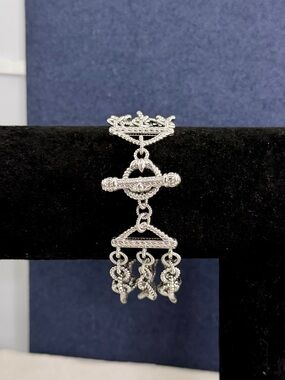 JUDITH RIPKA Sterling Silver 3-Strand Cable Twist Oval Link Toggle Bracelet; 8”
